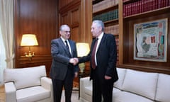 Greeck PM Lucas Papademos (L) and the head of the democratic left party Fotis Kouvelis in Athens