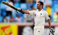 Pakistan's Younus Khan celebrates reaching his century against England in the third Test at Dubai