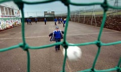 Children playing in the playground at Burlington primary school at Kirby-in-Furness in Cumbria