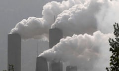 Smoke rises from a cement plant in Baokang