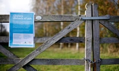 A sign warns of ash trees infected with Chalara dieback,  Woodland Trust Site near Framlingham