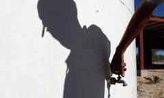 Drought in Mexico : A man turns on the tap of an empty water tank