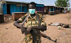 MDG : a rebel fighter stands in front of Kali-Ballee mosque, Bentiu, South Sudan