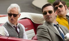 Roger Sterling (John Slattery), Don Draper (Jon Hamm) and Harry Crane (Rich Sommer) check things out