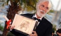 Austrian director Michael Haneke poses with the Palme d'Or award