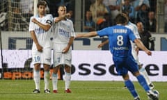Juninho strikes Lyon's third goal against Marseille with a trademark free-kick