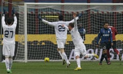 The Novara forward Andrea Caracciolo, centre, celebrates after scoring at San Siro