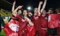 Cheltenham Town's players celebrate reaching the League Two play-off final