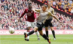 Bradford City's Nahki Wells scores against Northampton Town at Wembley stadium. 