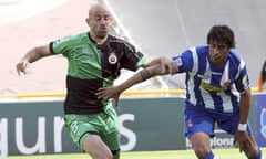 Espanyol's Argentinian midfield Roman Fernando, right, in action against Racing de Santander