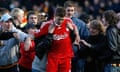 Steven Gerrard struggles to escape from a host of fans at Hull's KC Stadium