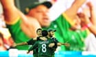 Pakistan captain Mohammad Hafeez, centre, celebrates with team-mates