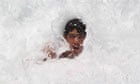 England's Alastair Cook bodyboarding on Ahungala beach