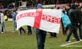 A Portsmouth fan with a flag