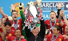 Sir Alex Ferguson lifts the Barclays Premier League trophy