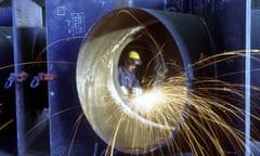 Woman Welder Working in Steel Water Pipe