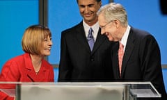 Sharron Angle and Harry Reid (r) speak after a TV debate during the Nevada Senate race.