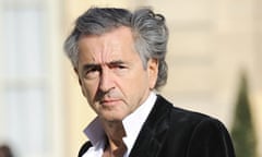 Bernard Henri-Levy arrives for a meeting between Libyan rebels and Nicolas Sarkozy in Paris.