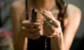 Female jeweller cutting chain with pincers, close-up