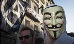 An Anonymous protester in Madrid earlier this month