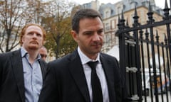 Kerviel arrives with one of his lawyers at the Paris court for the verdict in his appeal trial.