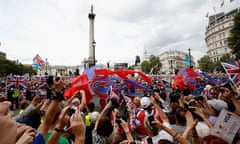 Crowds cheer as the London 2012 Victory Parade passes through Trafalgar Square
