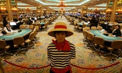 Gambling tables inside the casino at the Venetian Macao Resort Hotel.