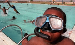 Child wearing snorkel and goggles