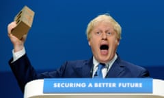 Boris Johnson holding a brick