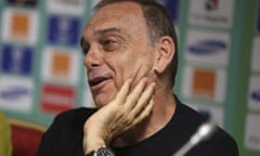 Ghana's head coach Avram Grant cracks a rare smile as he faces the media ahead of Sunday's Africa Cu