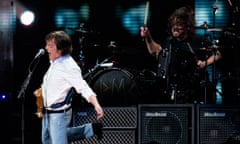 Paul McCartney performs with Dave Grohl at 12.12.12 benefit gig