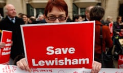 A resident of the Lewisham borough demonstrates against the proposed closure of health services
