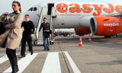 Passengers exit an EasyJet Plc airplane at Ferihegy airport