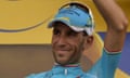 Italy's Vincenzo Nibali celebrates his overall leader