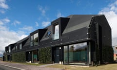 houses clad in rubber and ivy