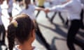 lonely girl watches as others children play