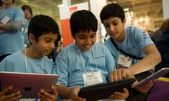 Young students try out the latest handheld "tablet" technology at Bett 2011