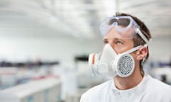 Scientist wearing gas mask in lab. Image shot 2011. Exact date unknown.