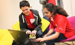 Two children in front of a laptop