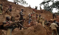 Men digging for gold in a pit in the Ituri Forest