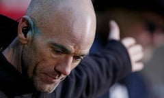 Michael Stipe of REM gestures backward