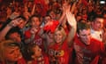 Manchester United fans celebrate outside Old Trafford