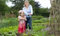 Samantha Hayward and her daughter Amy in their allotment in Guildford