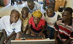 A basic computing training class in the community media room at Amref's Katine office.
