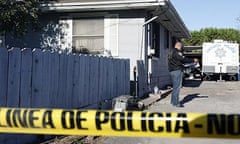 An Antioch, California police officer stands on the property of Phillip and Nancy Garrido.  The couple are accused of kidnapping Jacee Dugard. Photograph: Monica Davey/EPA