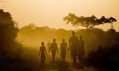 Children play during sunset at Ogwolo village, Katine