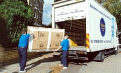 Men fill a removal van. 