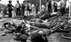 Bodies of dead civilians lie among mangled bicycles near Beijing's Tiananmen Square, 4 June 1989