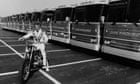 Evel Knievel and a row of 14 parked Greyhound buses in 1975