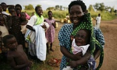 Women and children by a borehole in the Katine sub-county